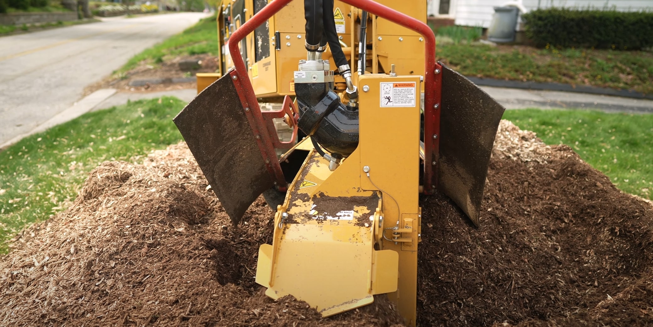 Professional stump grinding equipment removing tree stumps in La Habra